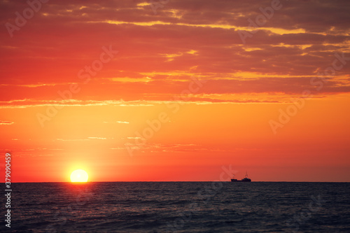 Early morning. Red sunrise over the sea © vvvita