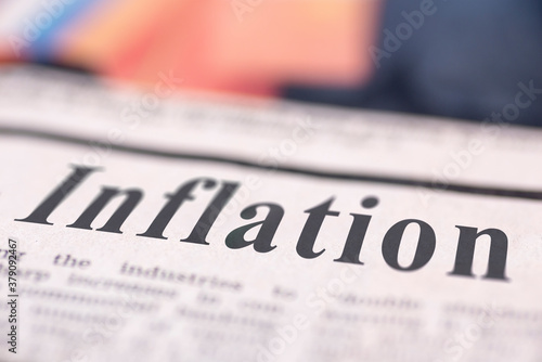 Inflation written newspaper photo