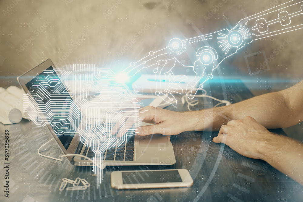 Man typing on keyboard background with brain hologram. Concept of big Data. Man typing on keyboard background with brain hologram. Concept of big Data.