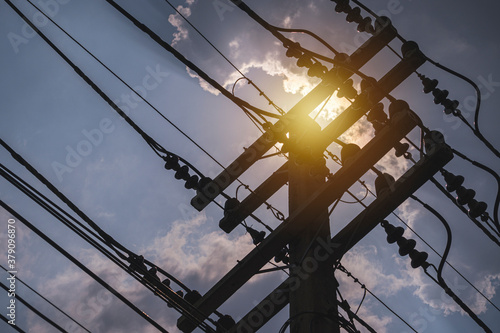 High voltage distribution system consisting of a pole, shielded high voltage cable, insulators support high voltage cables.