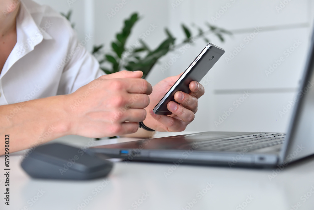 Trader man using smartphone and checks report data. Trader man using smartphone and checks report data.