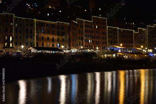 City of Camogli seen at night  with all its wonderful lights reflected in the sea