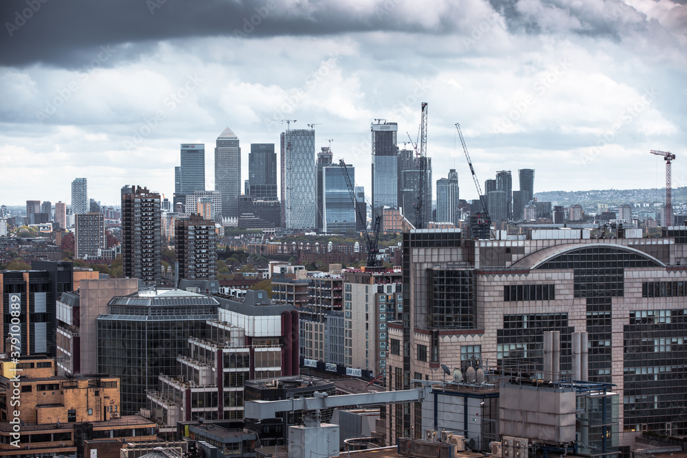 City of London  East side, Canary Wharf skyscrapers panoramic view. Office buildings, banks, international financial district. London, UK