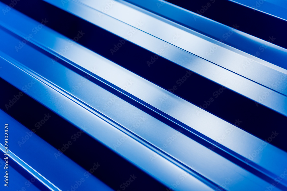 Fototapeta premium Blue metallic roof tiles background with drops of water.