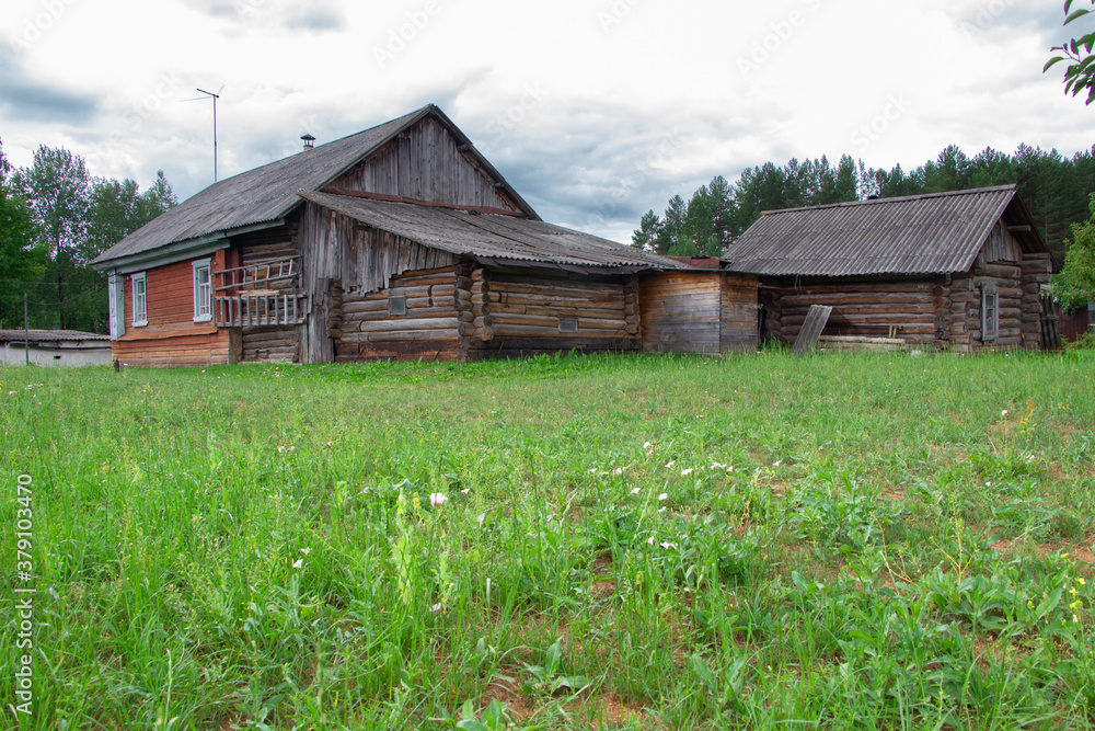 Photo of aged wooden house, back view Photo of aged wooden house, back view