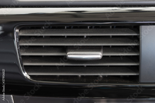 Air conditioner vent grill in a modern car © Lodimup