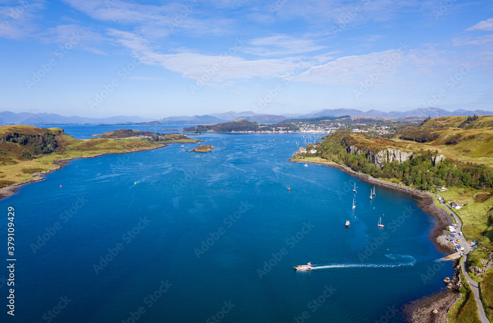 Fototapeta premium aerial view of the sound of kerrera and the island of kerrera near oban in the argyll region of the highlands of scotland during a clear blue calm day in autumn