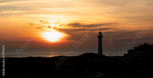 Obraz na płótnie Latarnia morska nad Morzem Północnym w Egmond aan Zee, Holandia Północna. w salonie