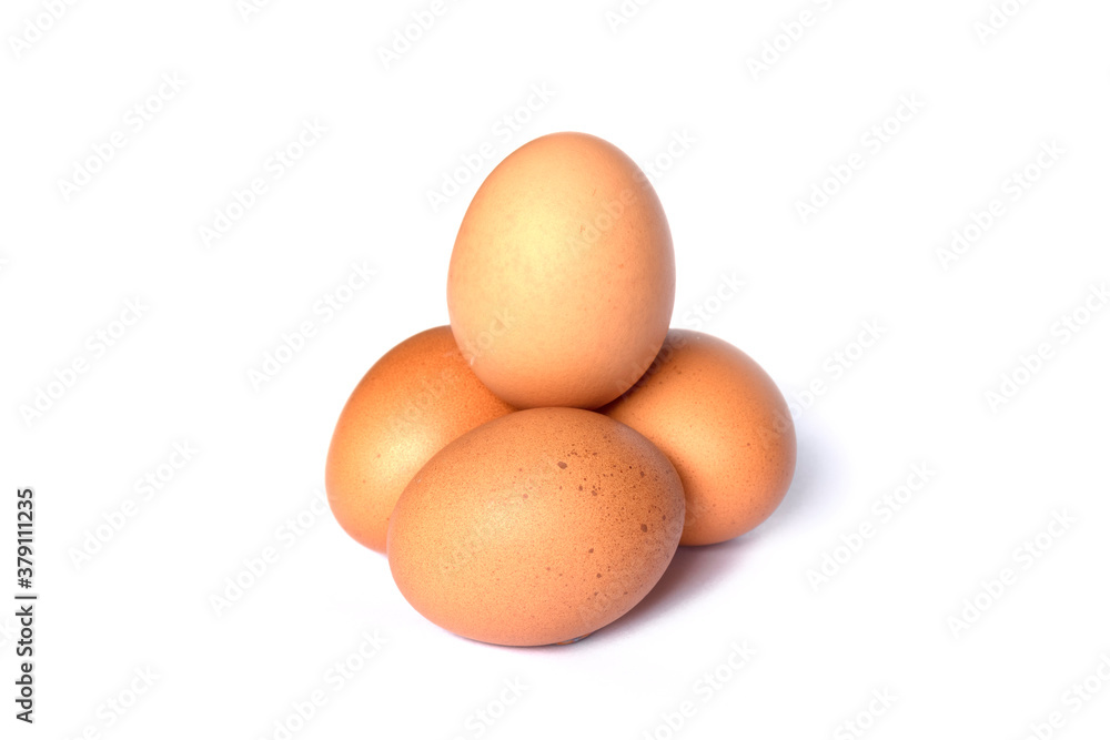 Four chicken eggs isolated on white background. Four chicken eggs isolated on white background.