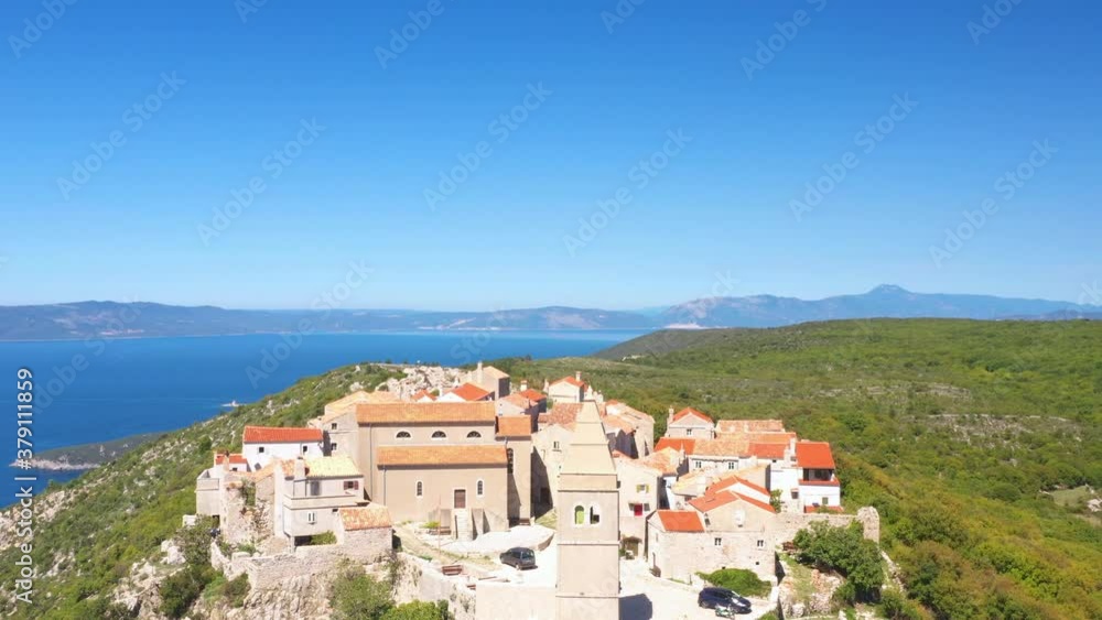 Amazing historical town of Lubenice on the high cliff, Cres island in Croatia, Adriatic sea in background, drone reveal footage
Amazing historical town of Lubenice on the high cliff, Cres island in Croatia, Adriatic sea in background, drone reveal footage