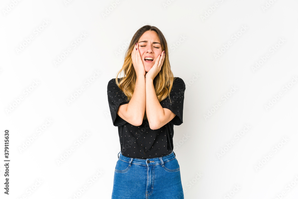 Young caucasian woman isolated on white background whining and crying disconsolately. Young caucasian woman isolated on white background whining and crying disconsolately.