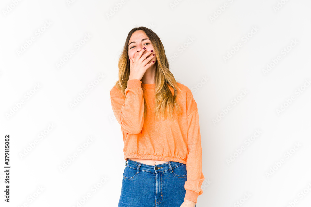 Young caucasian woman isolated on white background laughing happy, carefree, natural emotion. Young caucasian woman isolated on white background laughing happy, carefree, natural emotion.