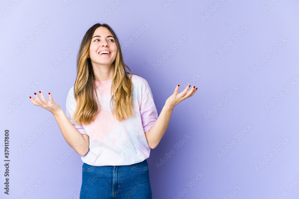 Young caucasian woman isolated on purple background joyful laughing a lot. Happiness concept. Young caucasian woman isolated on purple background joyful laughing a lot. Happiness concept.