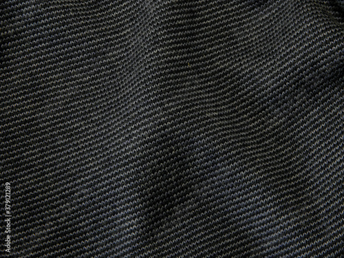 grey woolen or tweed fabric for grunge background