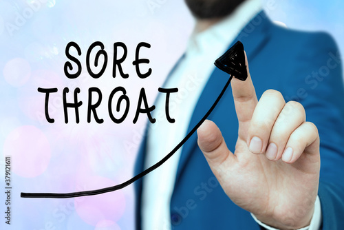 Conceptual hand writing showing Sore Throat. Concept meaning Inflammation ot the pharynx and fauces resulted from an irritation Digital arrowhead curve denoting growth development concept photo