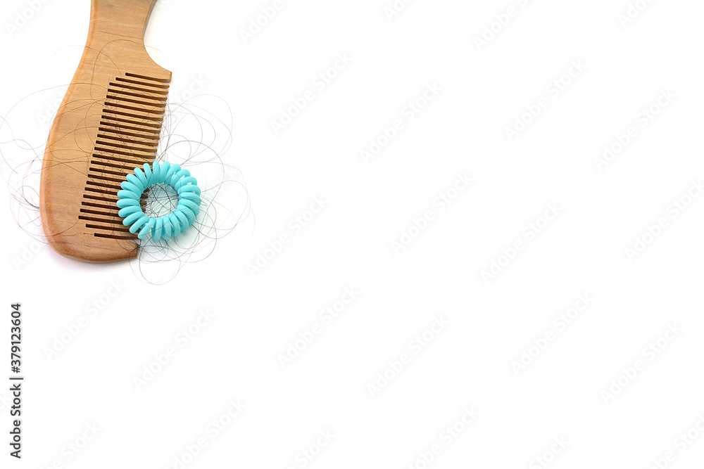 Hair loss, hair fall everyday serious problem, girl with a comb and problem hair on white background.
Hair loss, hair fall everyday serious problem, girl with a comb and problem hair on white background.