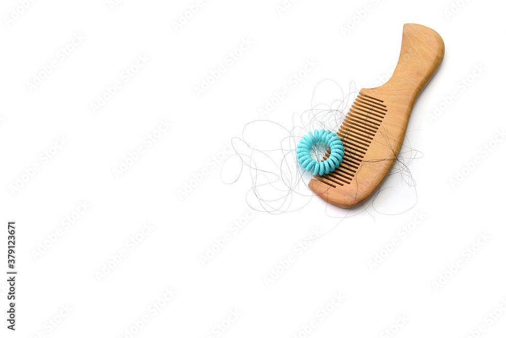 Hair loss, hair fall everyday serious problem, girl with a comb and problem hair on white background.
Hair loss, hair fall everyday serious problem, girl with a comb and problem hair on white background.