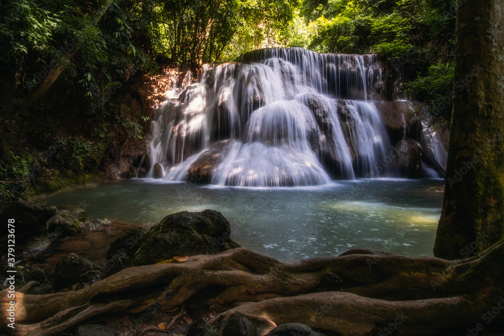 Fototapeta premium Huai Mae Khamin Waterfall , Landscape tropical rainforest at Srinakarin Dam, Kanchanaburi, Thailand.Huai Mae Khamin Waterfall is the most beautiful waterfall in Thailand. Unseen Thailand