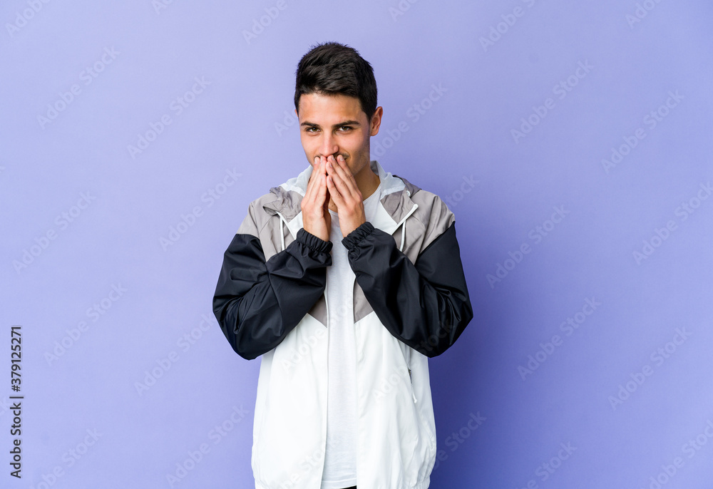 Young caucasian man isolated on purple background making up plan in mind, setting up an idea. Young caucasian man isolated on purple background making up plan in mind, setting up an idea.
