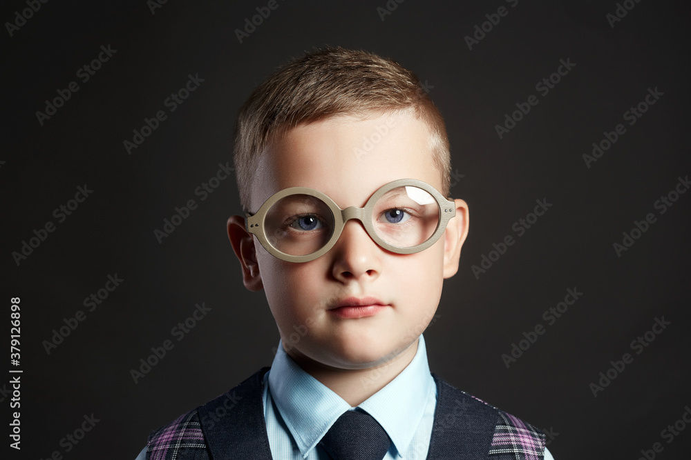 close-up portrait of smart little boy in glasses close-up portrait of smart little boy in glasses