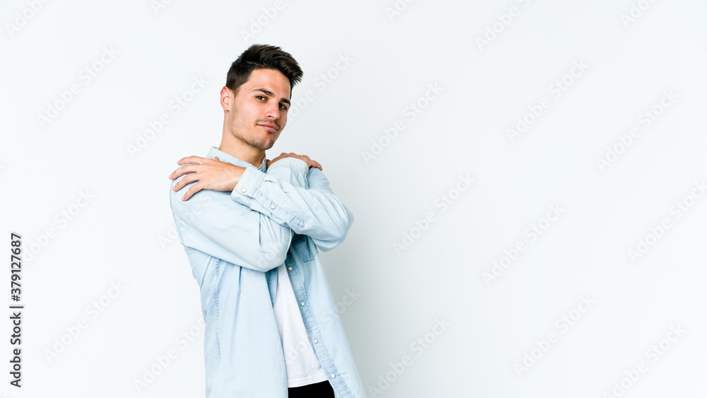 Young caucasian man isolated on white background hugs, smiling carefree and happy. Young caucasian man isolated on white background hugs, smiling carefree and happy.