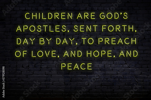 Fotografie Smart and motivational quotation. Neon sign on brick wall