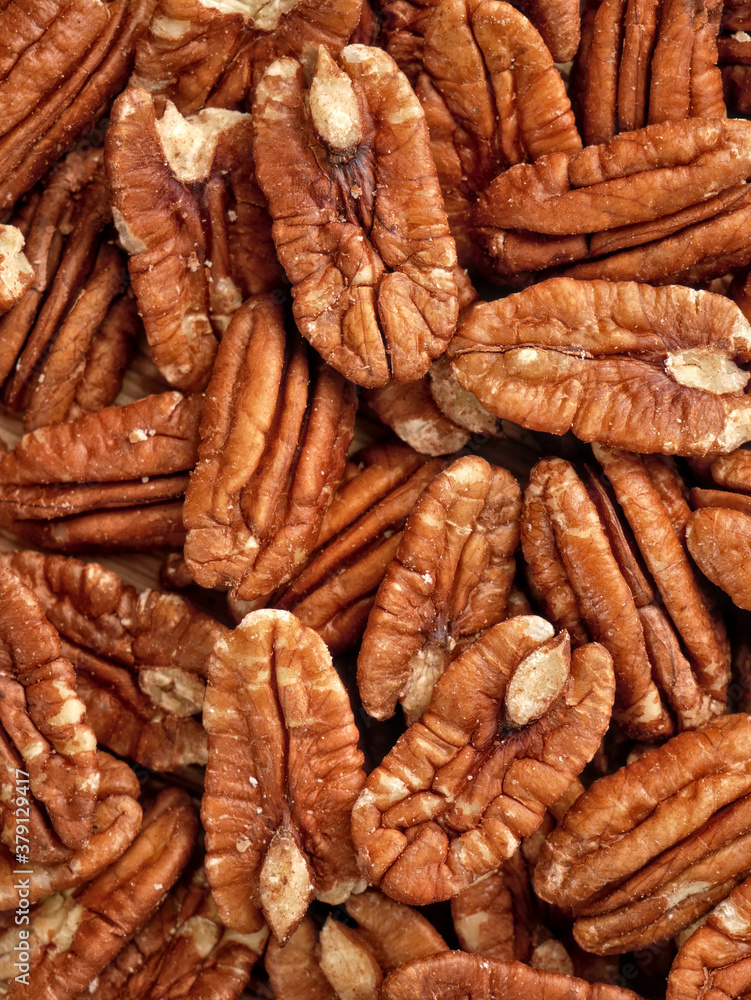 Pecans nuts top view. Source of healthy fats, fiber and protein. Pecans nuts top view. Source of healthy fats, fiber and protein.