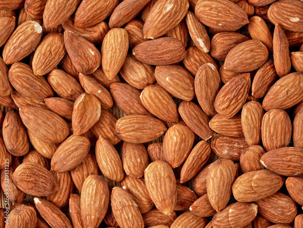 Almonds healthy tree nuts. Super foods - high in protein, fiber, healthy fat, vitamin E and minerals. Almonds healthy tree nuts. Super foods - high in protein, fiber, healthy fat, vitamin E and minerals.