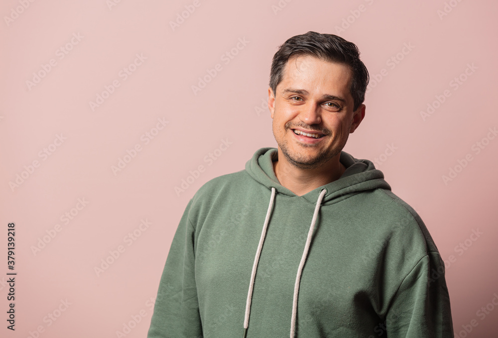 white guy in green hoodie