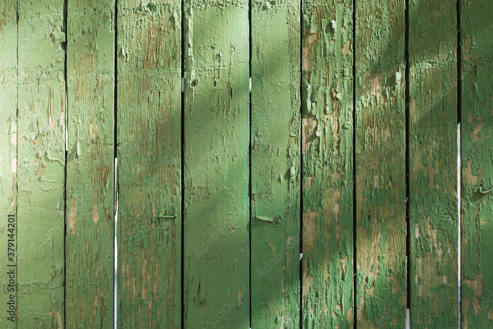 A close up of a green door