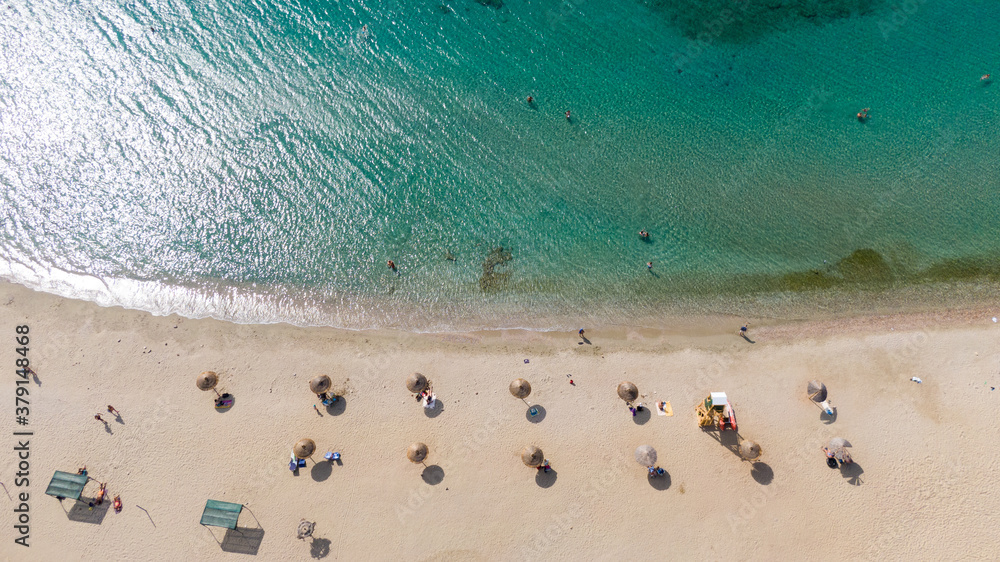 Aerial view of turquoise clear water and sandy beach of Ireon or Limni Vouliagmeni Lake in Peloponnese, Greece Aerial view of turquoise clear water and sandy beach of Ireon or Limni Vouliagmeni Lake in Peloponnese, Greece