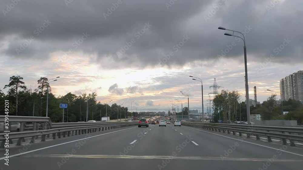 Russia. Moscow. 18.09.2020 A view through the windshield of a car on a six-lane highway with interchanges along which cars move. Russia. Moscow. 18.09.2020 A view through the windshield of a car on a six-lane highway with interchanges along which cars move.