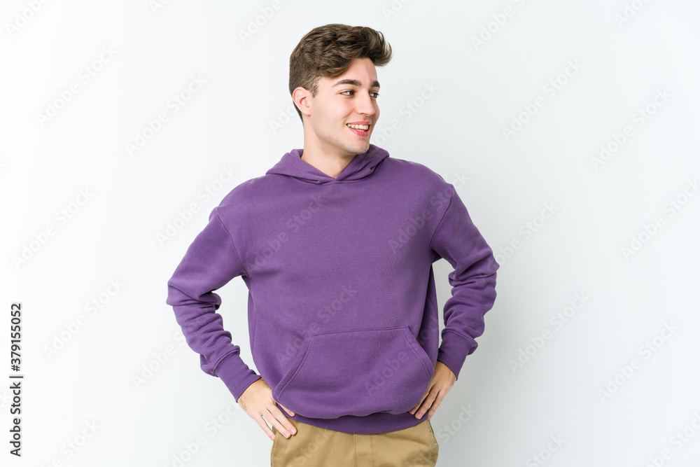 Young caucasian man isolated on white background confident keeping hands on hips. Young caucasian man isolated on white background confident keeping hands on hips.