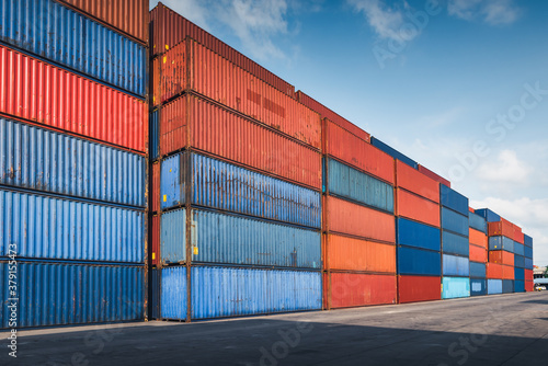 Stack of Containers Cargo Ship Import/Export in Harbor Port, Cargo Freight Shipping of Container Logistics Industry. Nautical Transport Distribution Yard, Business Commercial Dock and Transportation.