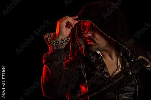 Medieval man with a hood.