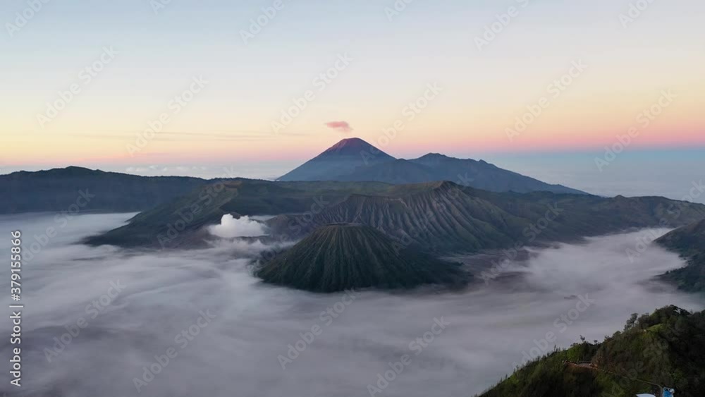 Slow travelling of Gunung Bromo Volcano in Java, Indonesia at sunrise Slow travelling of Gunung Bromo Volcano in Java, Indonesia at sunrise