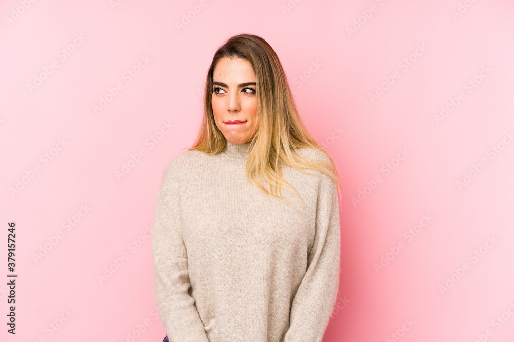 Middle age woman over isolated background confused, feels doubtful and unsure. Middle age woman over isolated background confused, feels doubtful and unsure.