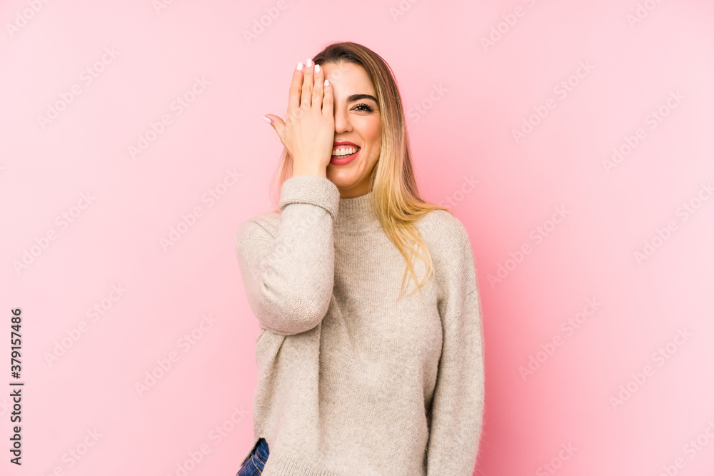 Middle age woman over isolated background having fun covering half of face with palm. Middle age woman over isolated background having fun covering half of face with palm.