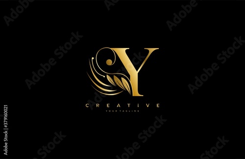 Initial Y letter luxury beauty flourishes ornament golden monogram logo