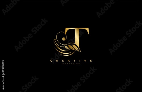 Initial T letter luxury beauty flourishes ornament golden monogram logo