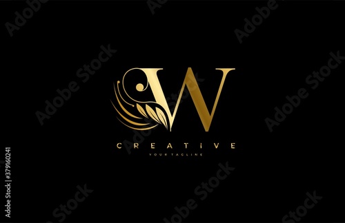 Initial W letter luxury beauty flourishes ornament golden monogram logo