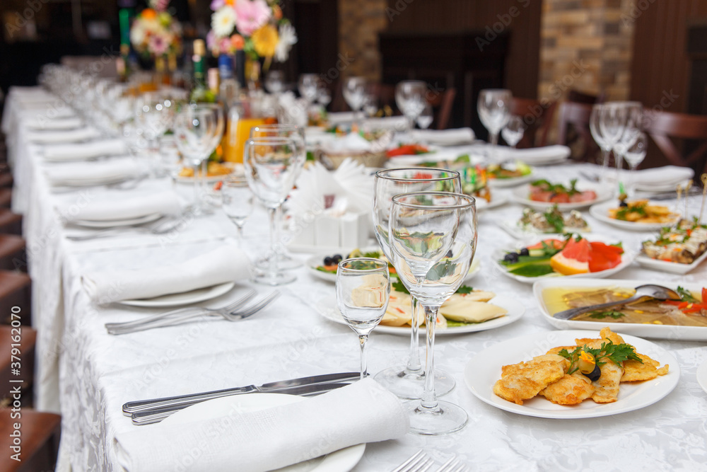 Fototapeta premium Table set for wedding or another catered event dinner.