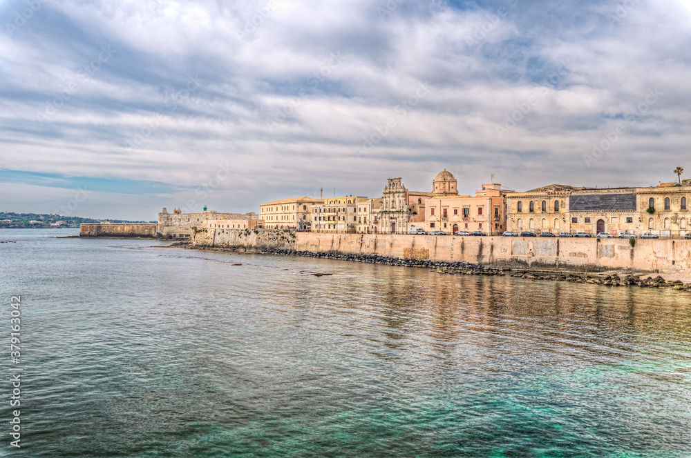Syracuse Sicily/ Italy -April 11 2020: The breathtaking scenery of the Ortigia seafront in Syracuse Sicily