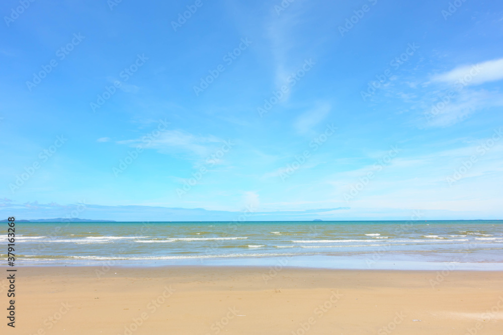Beautiful tropical beach with sand and blue sky