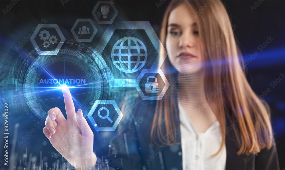 Business, Technology, Internet and network concept. Young businessman working on a virtual screen of the future and sees the inscription: Automation Business, Technology, Internet and network concept. Young businessman working on a virtual screen of the future and sees the inscription: Automation