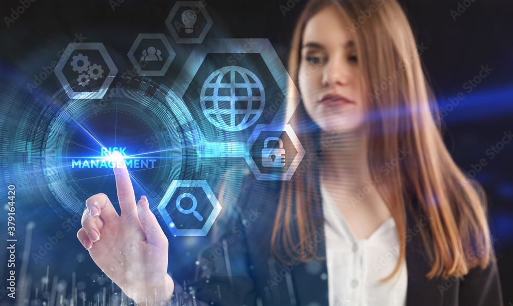 Business, Technology, Internet and network concept. Young businessman working on a virtual screen of the future and sees the inscription: Risk management Business, Technology, Internet and network concept. Young businessman working on a virtual screen of the future and sees the inscription: Risk management