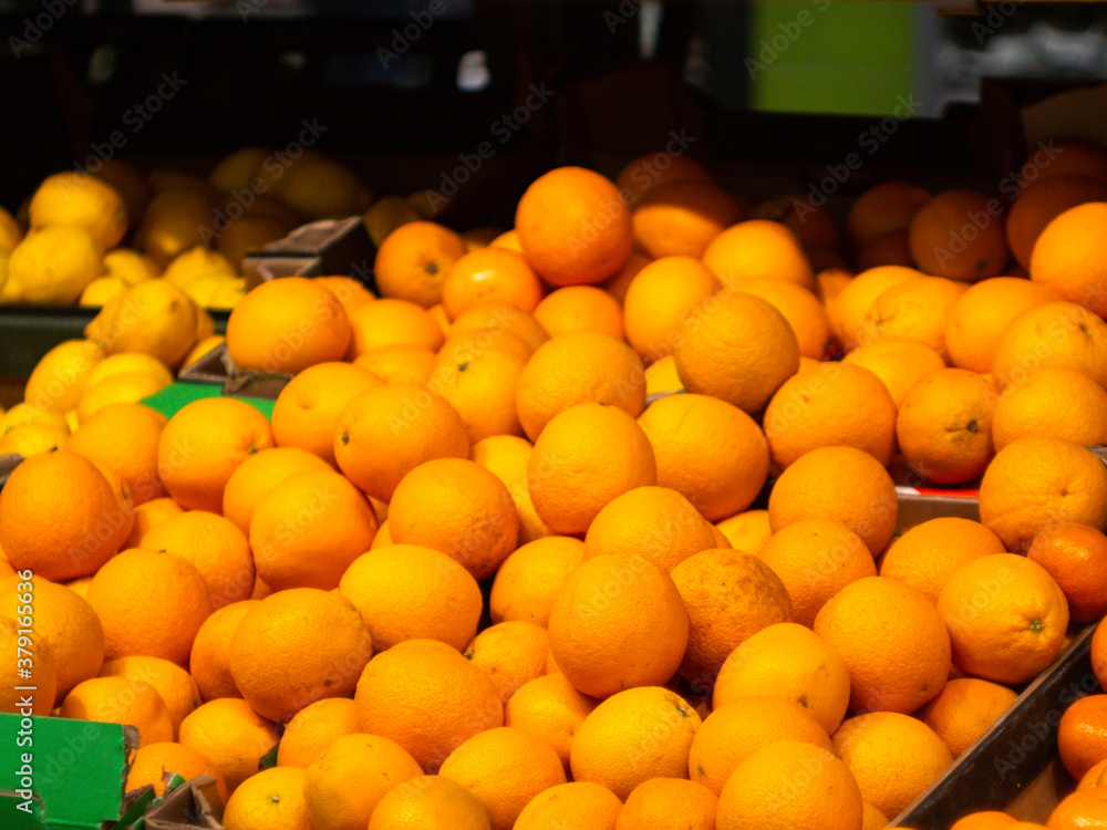 oranges on the store counter. fresh fruit.