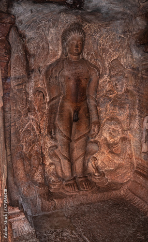 cave sculptures of jain gods carved on walls ancient stone art in details