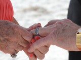 senior beach wedding ring exchange