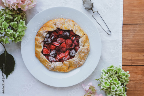 Delicious freshly baked vegan strawberry and cherry galette.